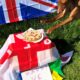 Dog with cake and UK flags